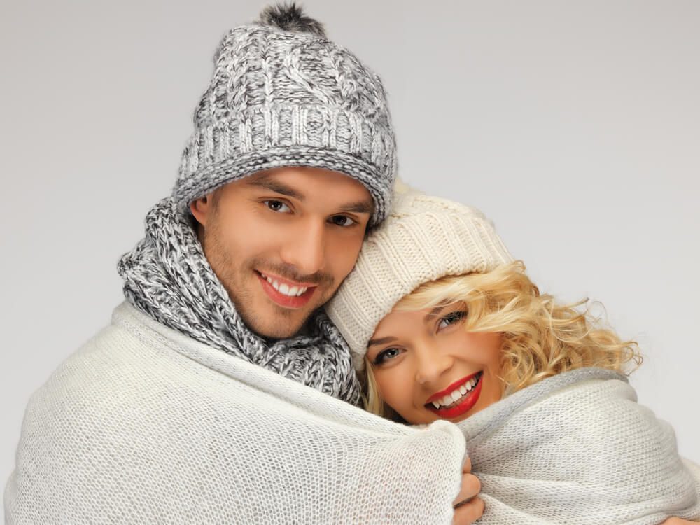 Healthy couple staying warm